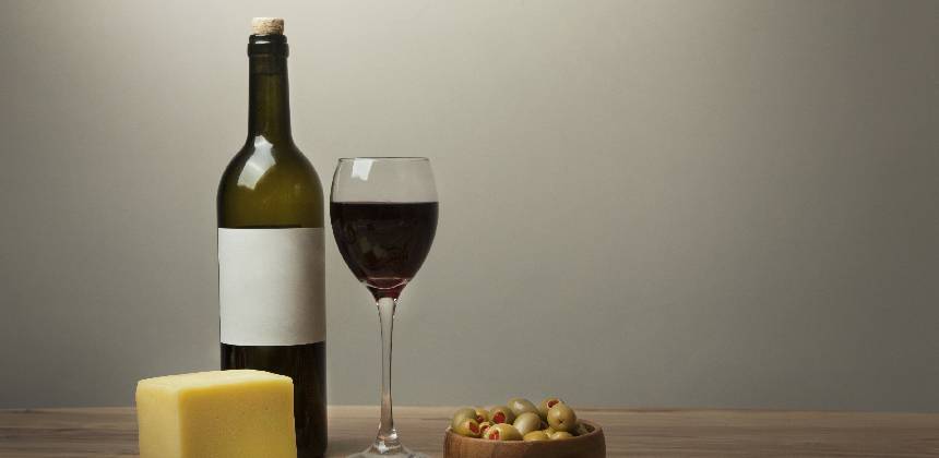 Bottle of red wine and cheese